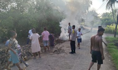 Bhabinkamtibmas-Aipda-Hironimus-Taji-Werang-Bersinergi-Kerja-Bakti-Bersama-Warga-untuk-Cegah-DBD